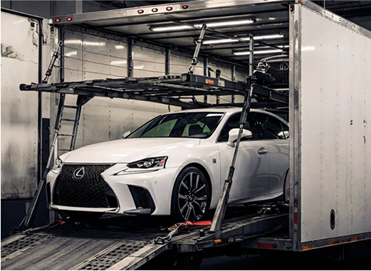 Car being loaded for shipping